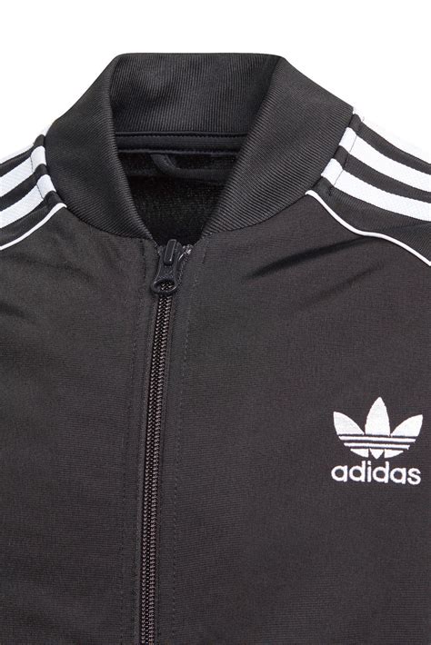 adidas vest zwart met witte stippen|Trainingsjacks en trainingsvesten .